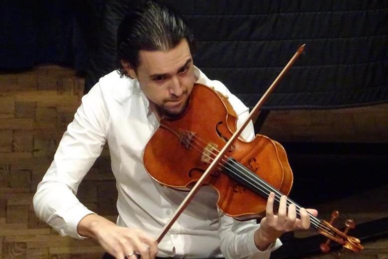Paul Laraia plays viola in the Tertis competition.