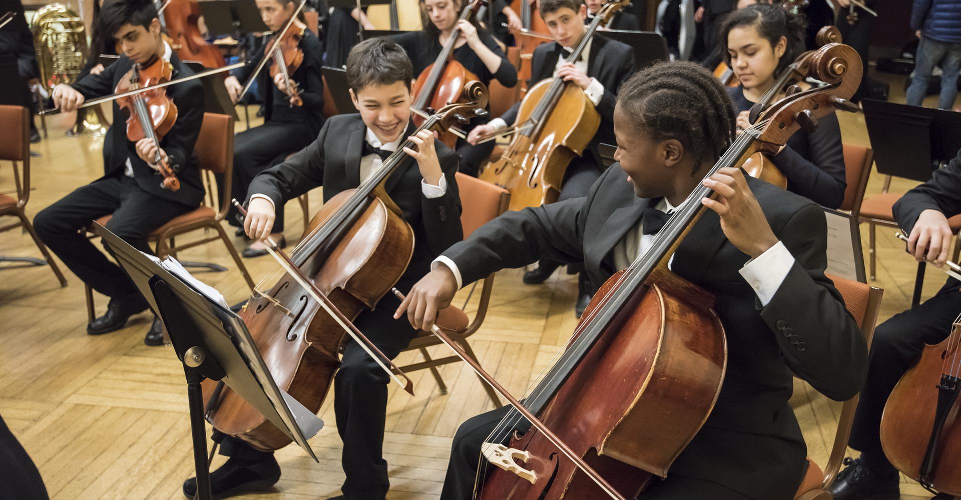 Prep Youth Symphony Cellists laughing