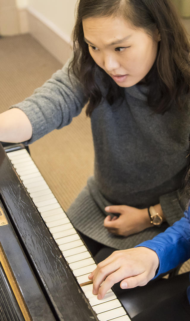 An N E C Prep piano lesson