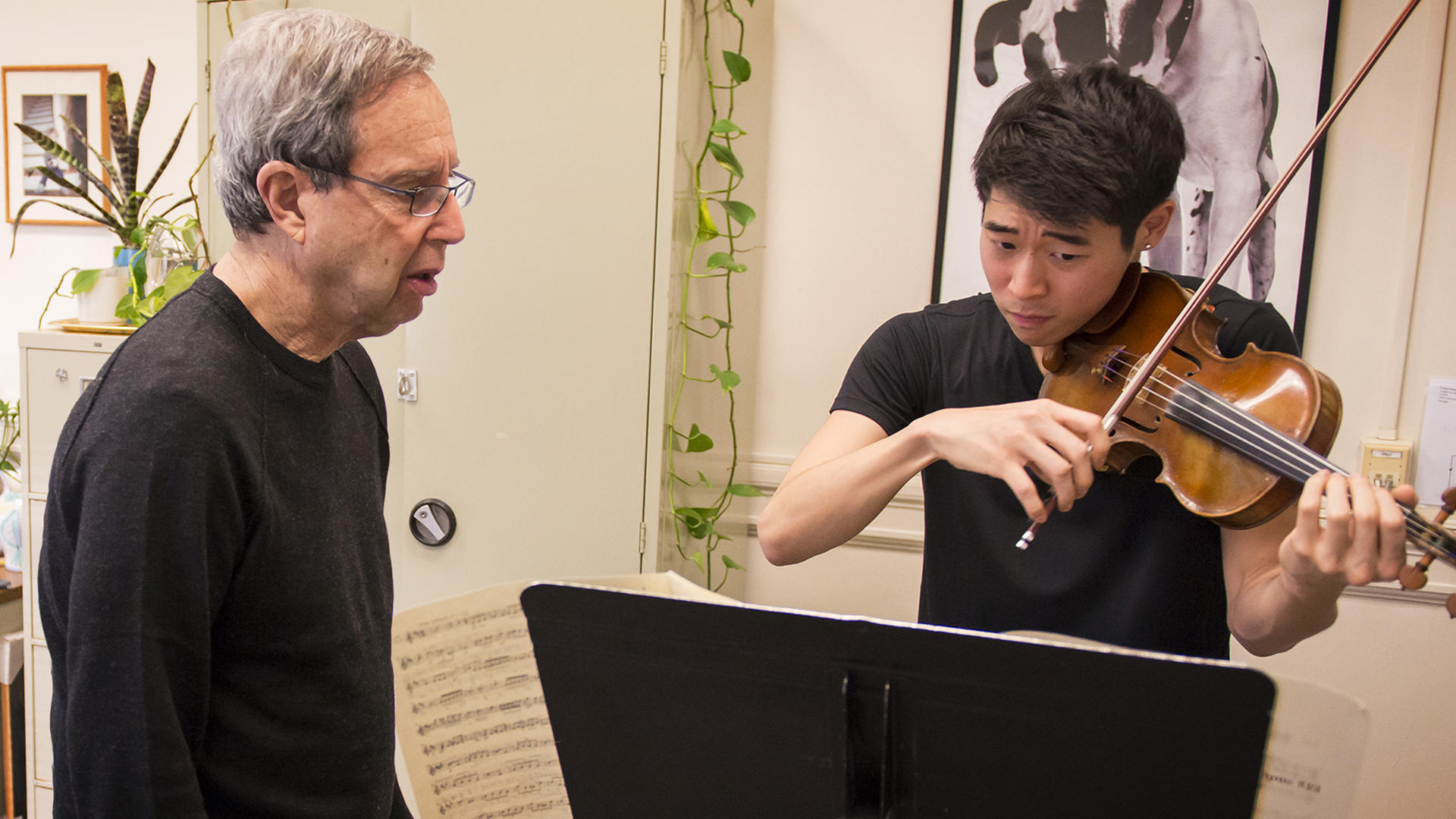 Donald Weilerstein teaches a violin lesson