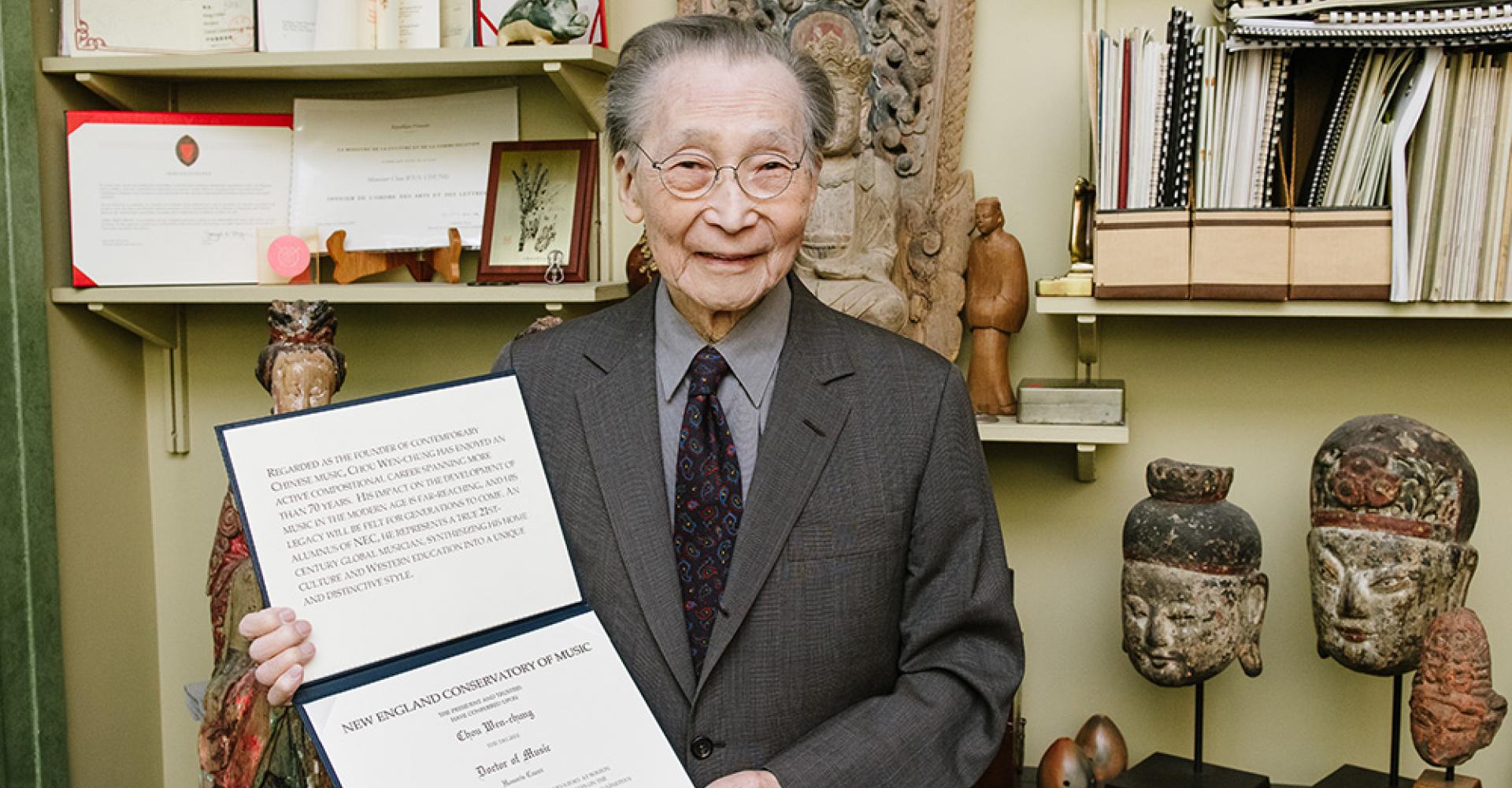 Chou Wen-chung holding his honorary degree