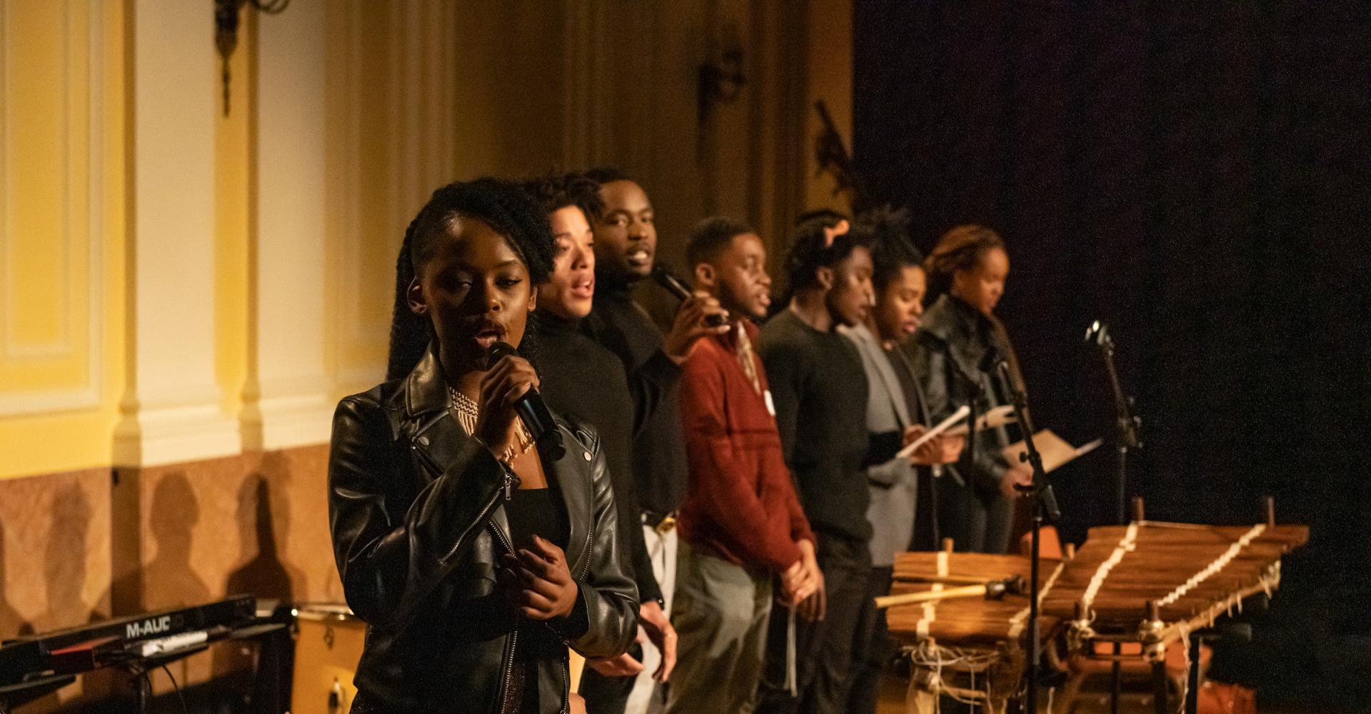 Members of the Black Student Union sing the Black National Anthem "Lift Every Voice and Sing" at the 2020 annual Coretta Scott King concert