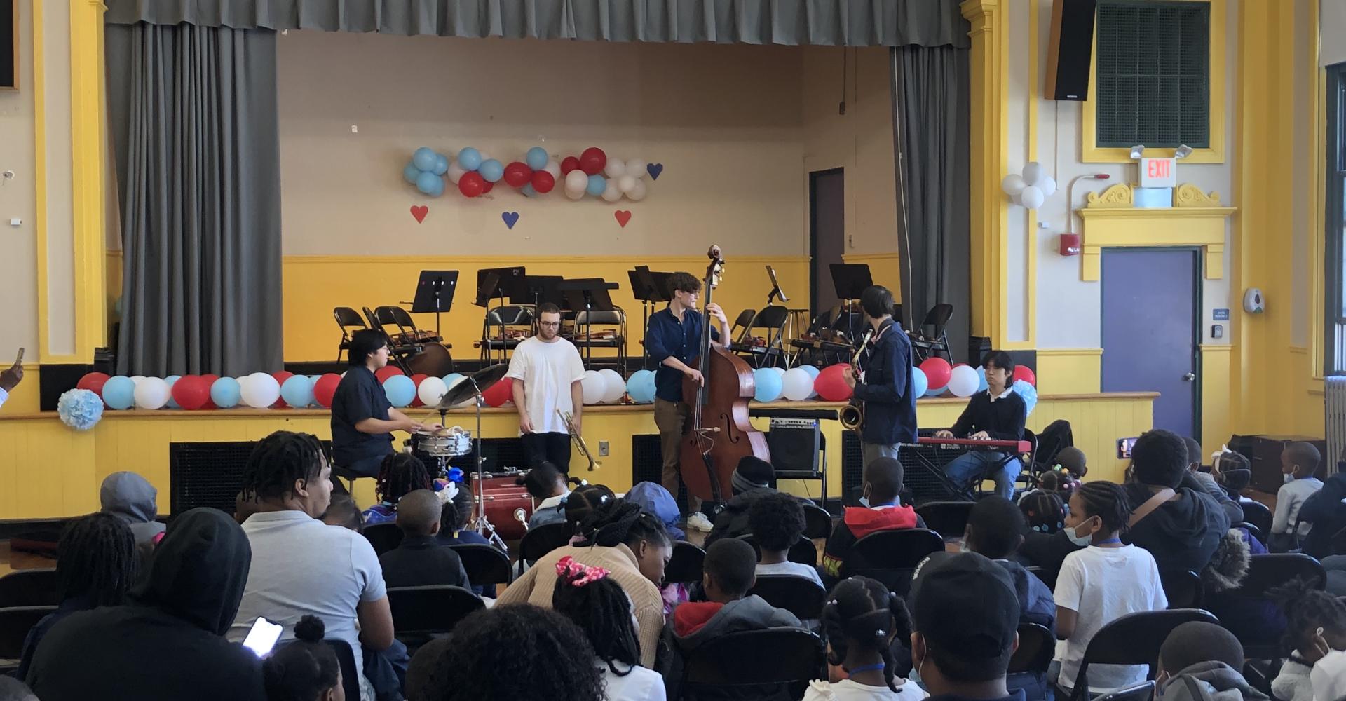 Jazz group playing at a school
