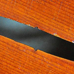 Close-up of violin f-hole