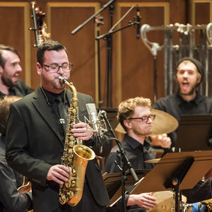 A saxophonist performs with the NEC Jazz Orchestra