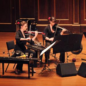 An electric string quartet performs George Crumb